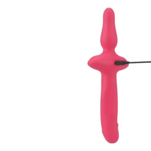 A pink silicone personal massager with a bulbous, contoured shape and a charging cable connected to the side, displayed against a white background.