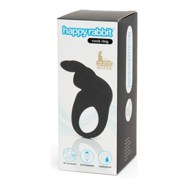 A black Happy Rabbit cock ring in its packaging, featuring product features like 12 functions, rechargeable, and waterproof, with blue and white branding and a gold award symbol on the front of the box.