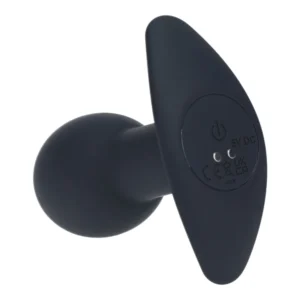 A black silicone device with a rounded base and a flat, winged handle. The handle features a power button, charging port, and certification symbols.