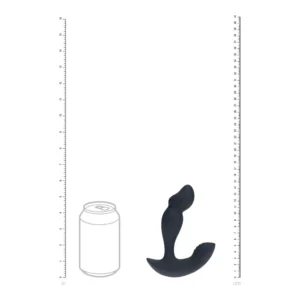 Black silicone prostate massager shown upright beside a fizzy drink can outline for size comparison; rulers in inches and centimetres are on each side of the image.
